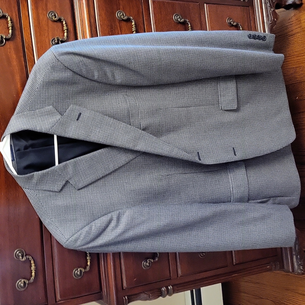 Mens sport coat size 46 long by Stafford. Slightly used blue/gray material.